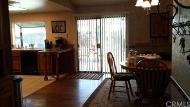 Exit to back yard is only 1 of 3 sliding glass doo