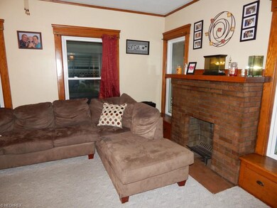 Living Room with decorative fireplace