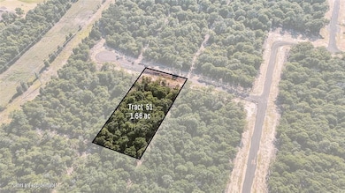 Aerial view of property and surrounding area featuring property boundaries highlighted