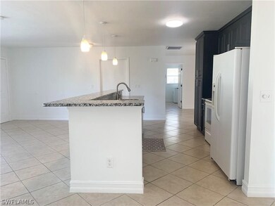 410 Broadmoor St, Lehigh Acres, FL 33974 - photo 3