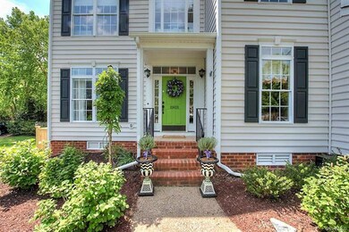This pop of color on the front door is trendy and 