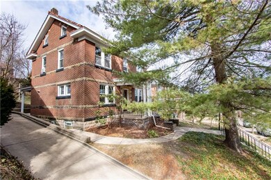 Brick and stone home with beautiful tile roof and 