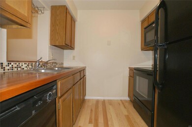 Kitchen boasts CHERRY Butcher Block Counters CUSTO
