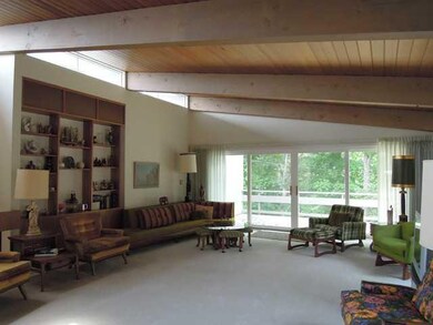 Living Room. Dramatic vaulted ceilings with beams,