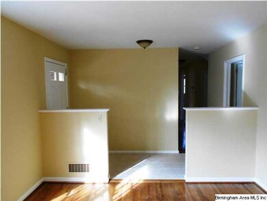 Looking from the living room into the foyer that h