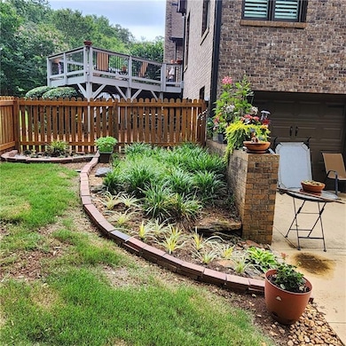 View of yard with a deck