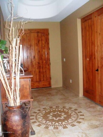 foyer view of front door solid knotty al