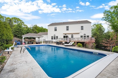 This amazingly perfect heated in ground pool is re