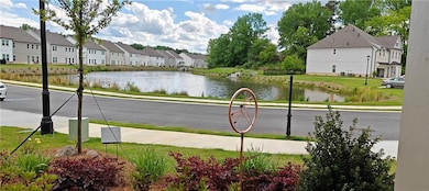 Property view of water featuring a residential vie