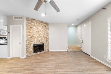 Natural light fills the main living space, highlig