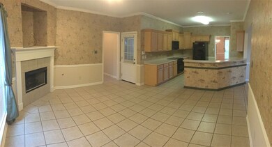 Eat in kitchen with sitting area and bar