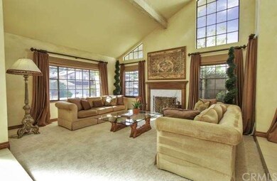 Living room smooth ceilings and lots of natural li