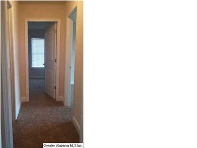 Hallway that leads to 2 bedrooms and 2nd bath