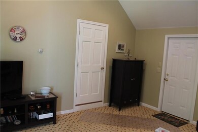 Entrance to the kitchen on the left.