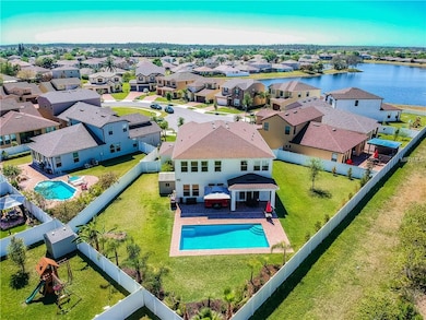 Nearly 1/3 acre lot with sparkling pool and fenced