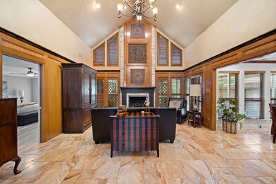 Large Living Room with vaulted ceiling and views o