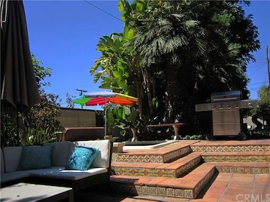 Raised Hot Tub and Grilling Area.