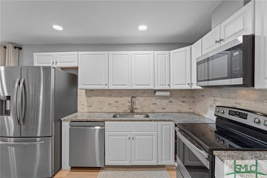Stainless steel appliances; Fridge and stove 3.5 y