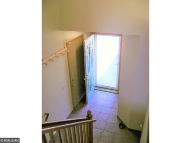 Nice sized ceramic tile front entry with coat clos