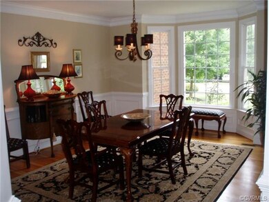 Dining Room overlooks front yard through attractiv