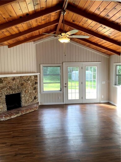 Comfortable Family Room with Fireplace and Cathedr