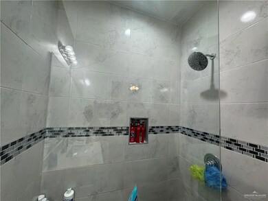 Bathroom with a tile shower