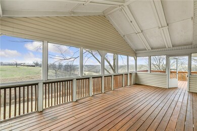 Covered and screened in deck. Awesome views.