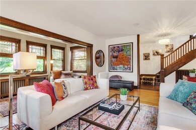 A view of the living room looking into the foyer a