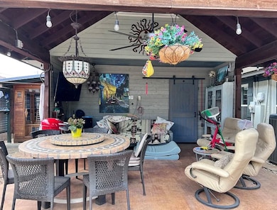 View of patio featuring outdoor dining area
