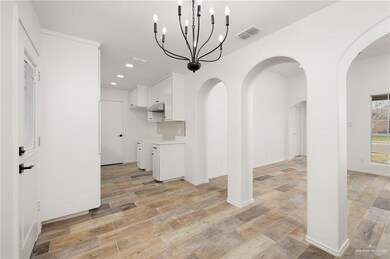 Unfurnished dining area with light hardwood / wood-style flooring