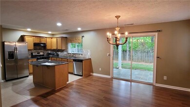 Kitchen with appliances with stainless steel finis