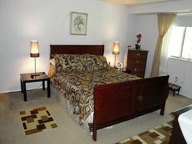 Master Bedroom. The spacious master bedroom offers a wall of closets.