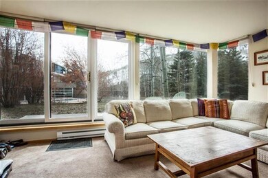 Panoramic windows leading out to the pat
