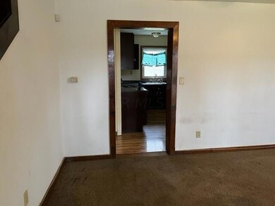 LIVING ROOM LEADING TO THE KITCHEN