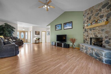 Nice entry foyer to Great room and powder room.