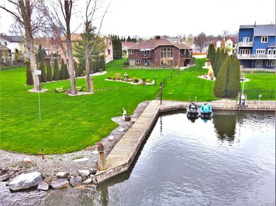 The long dock is owned by the sellers the dock that passes in front of the jet skis is shared between the two houses