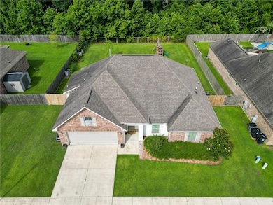 The home offers a two-car garage with ample off-street parking.