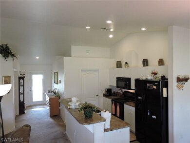 Kitchen view with bar counter top