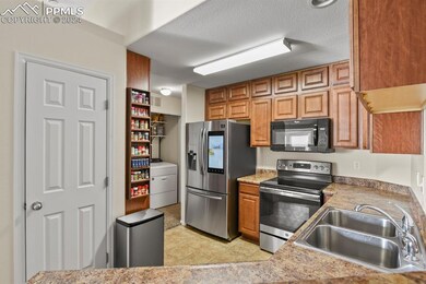 Kitchen featuring appliances with stainless steel 