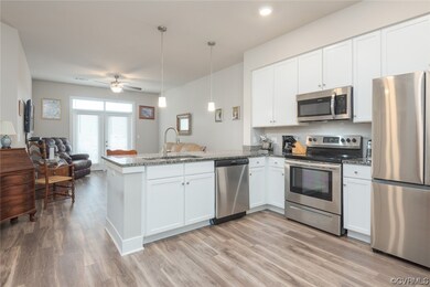 Kitchen with appliances with stainless steel finis