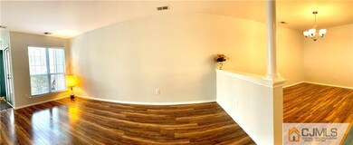 Living room connect to Dinning Room w/ Wood Floor