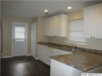 Large Kitchen with plenty of cabinet space. New co