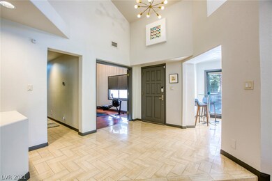 Enter this charming home through beautiful 8-panel