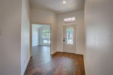 Entryway with a view of office