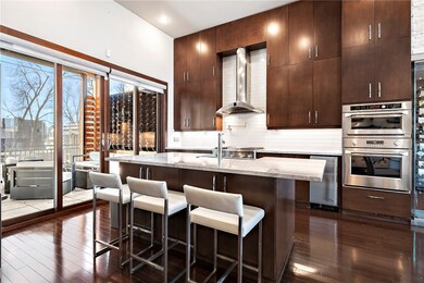 The large island provides space for an eat-in kitchen.