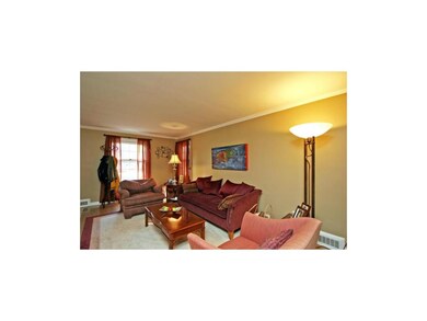 Living room has lots of natural light--front windo