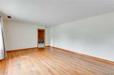 Unfurnished room with light hardwood / wood-style