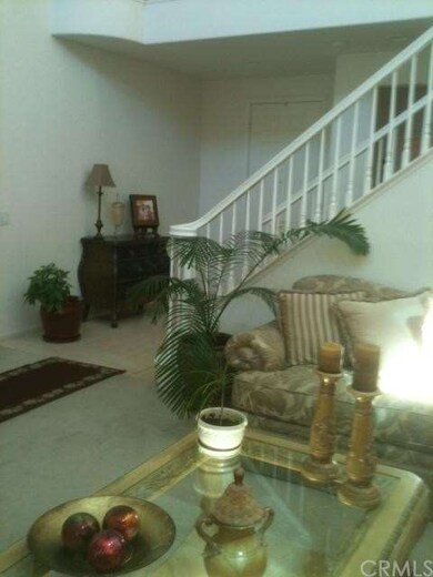 Other side of living room looking toward front doo