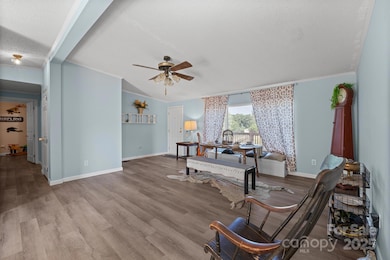 Living Room with new LVP floors and plenty of natural light