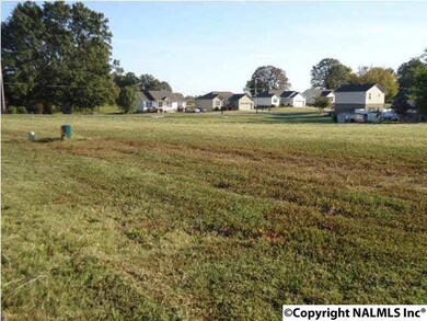 Level building lot with water and sewer tap fees already paid